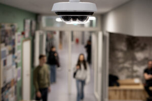 A security camera monitoring a school’s interior.